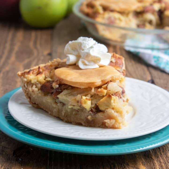 slice of apple pie on white plate