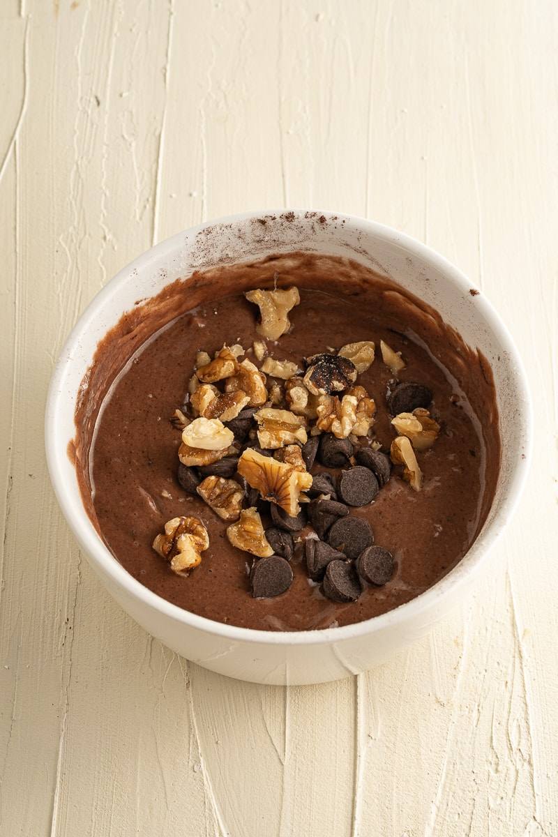 brownie mug cake batter in a mug