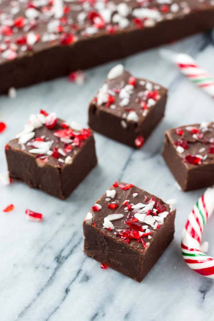 This Candy Cane Chocolate Fudge is smooth, creamy & perfect for Christmas! So easy to make - it's a great gift too!