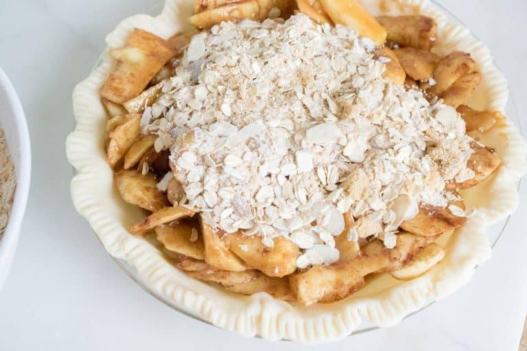 unbaked Caramel Apple Crumble Pie with crumble mixture on top