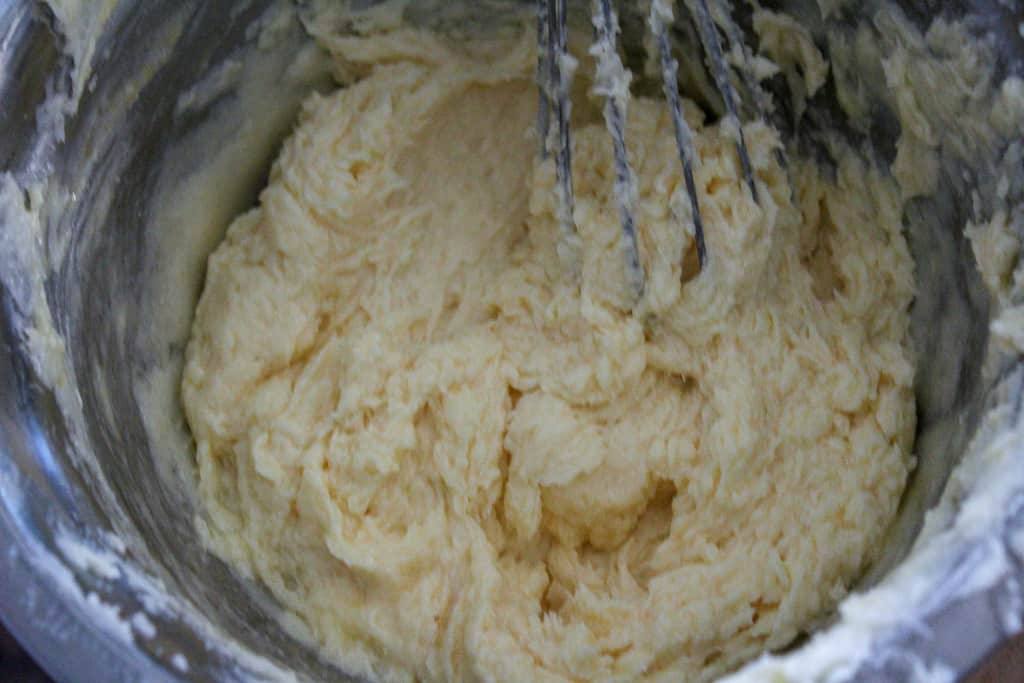 Carrot cake cookies wet ingredients creamed together in a bowl