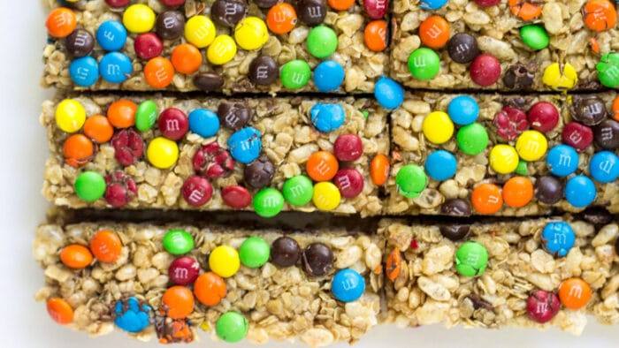 These homemade chewy M&M granola bars are the perfect after school snack. No bake, soft & chewy, and filled with M&Ms!