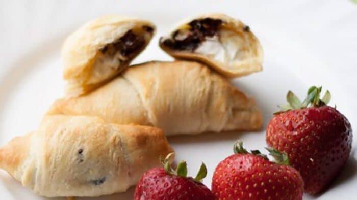 Chocolate Cream Cheese Croissants recipe is a quick and easy breakfast recipe to fancy up any breakfast or brunch. Served with strawberries.