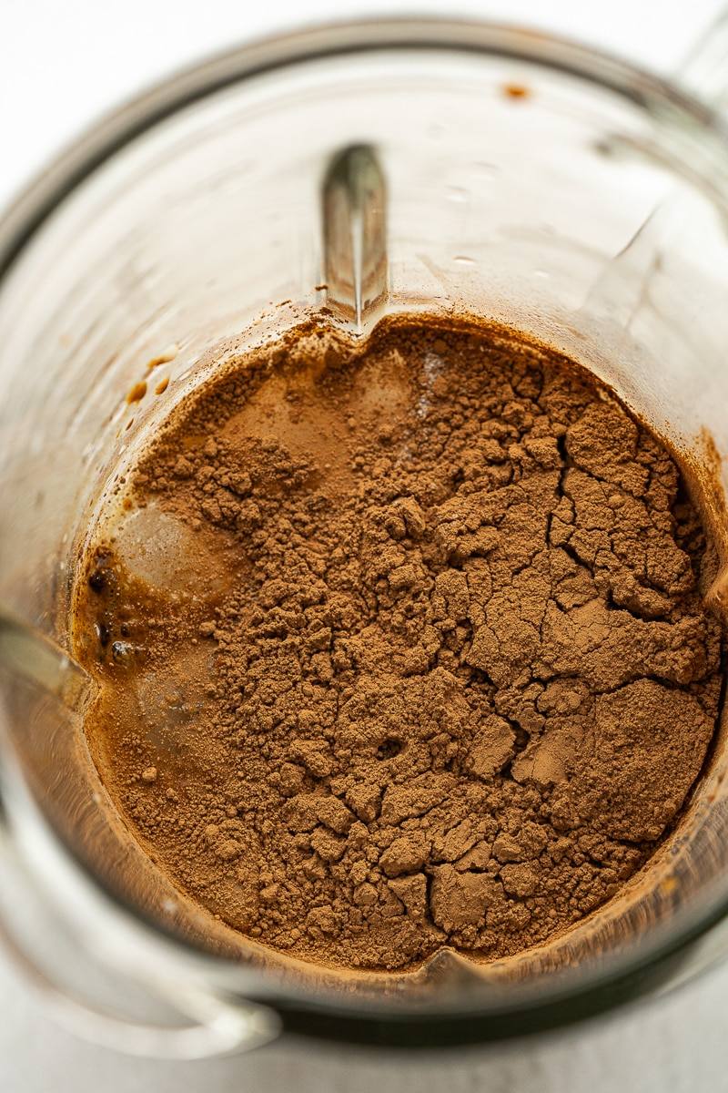 chocolate protein shake ingredients inside a blender