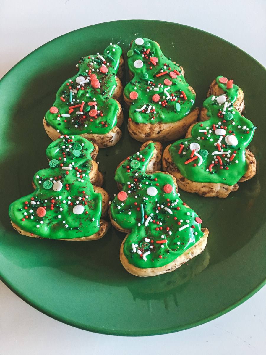 plate of five christmas tree cinnamon rolls