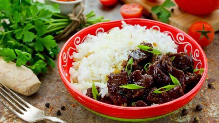 You will love this inspired Copycat Mongolian Beef recipe served with white rice. Easy to make at home and every bit as tasty as the restaraurnt recipe.