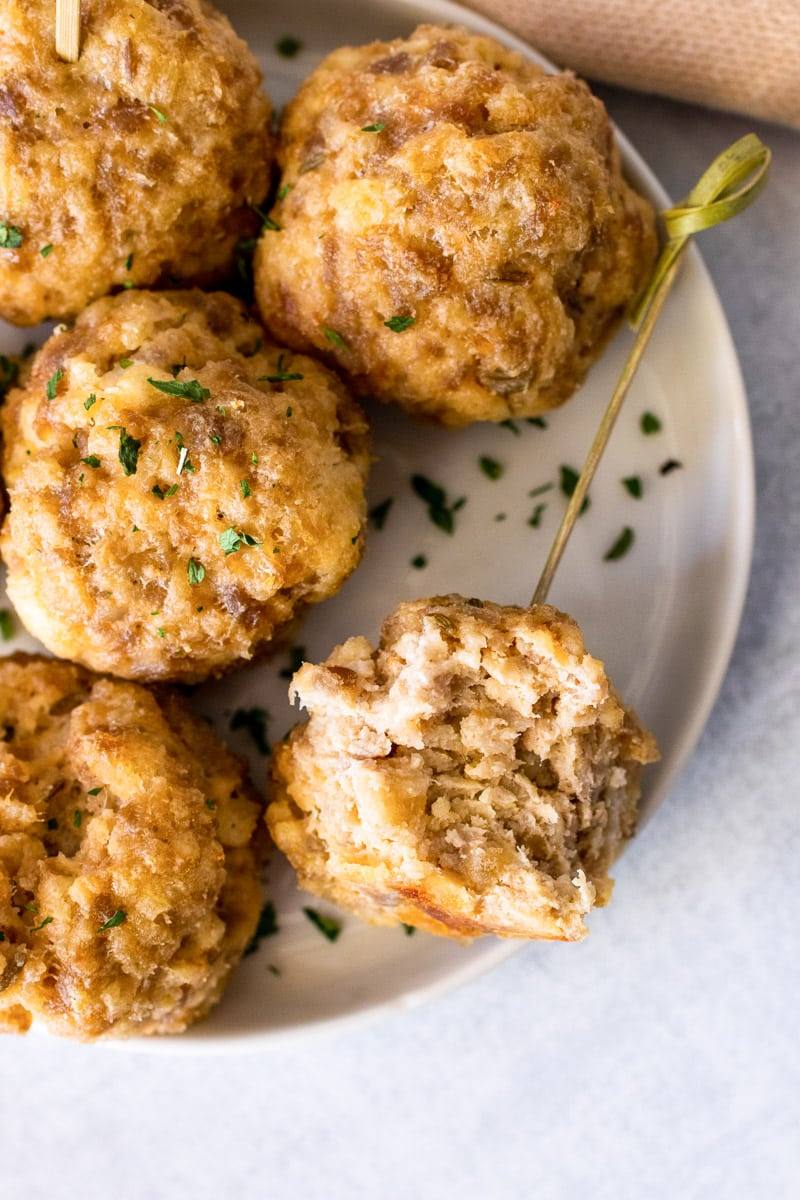 close up cream cheese sausage balls with bite out