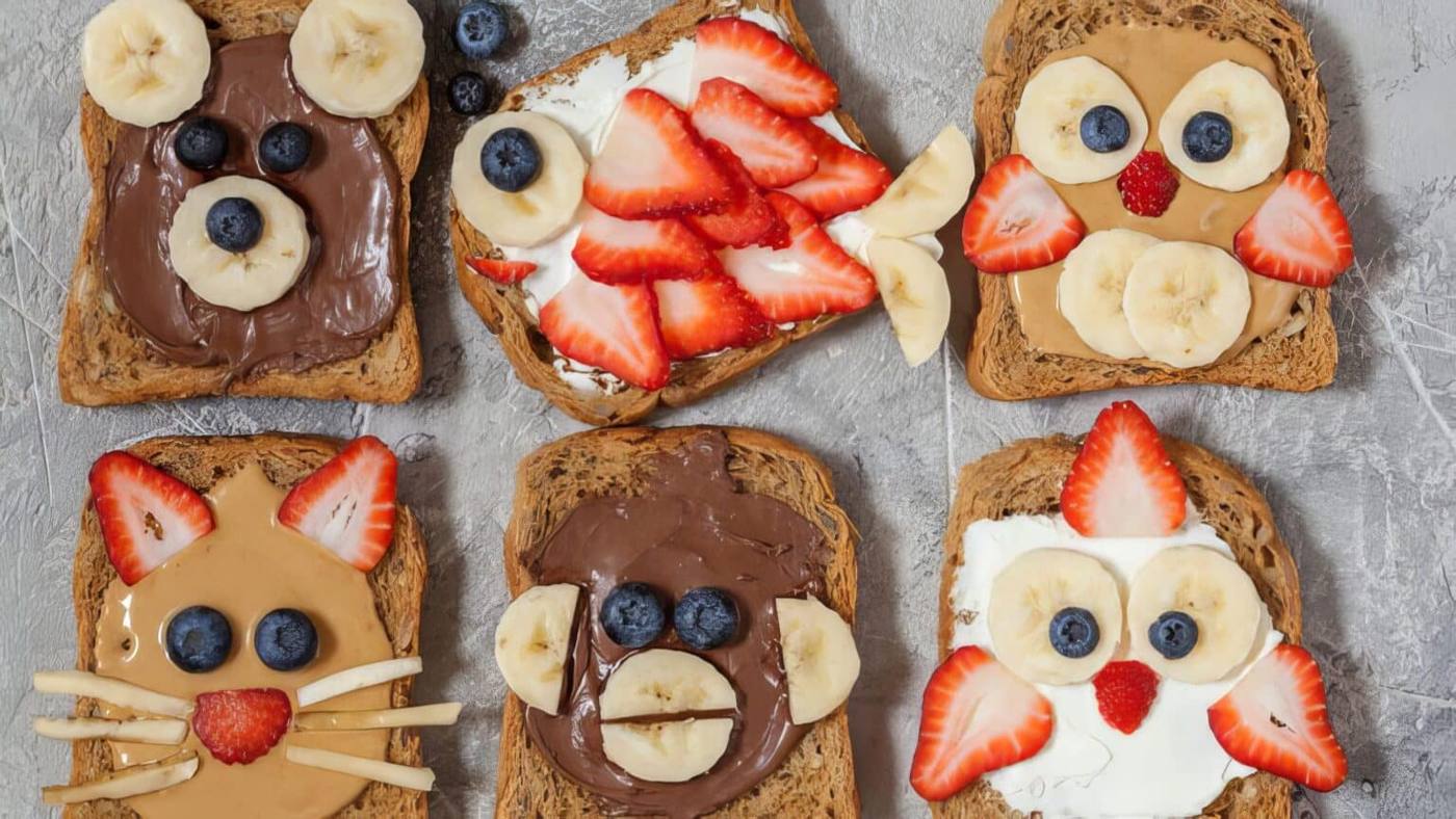 toasts decorated with animal faces made from food