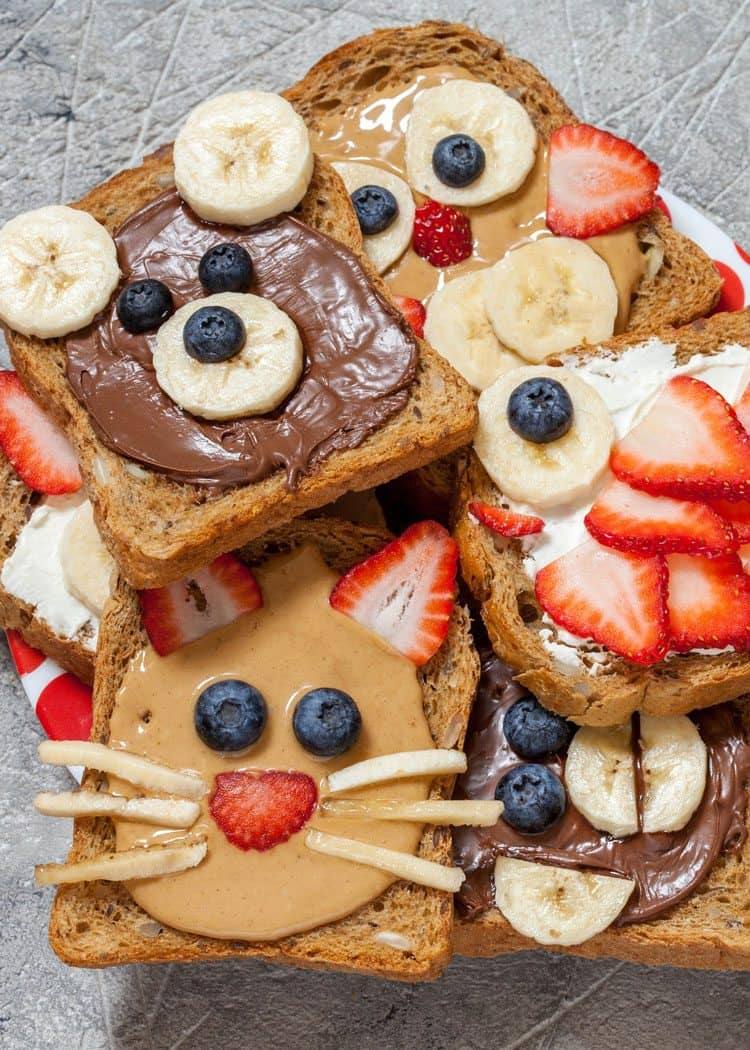 close up of the animal face toasts, decorated with funny faces made with food