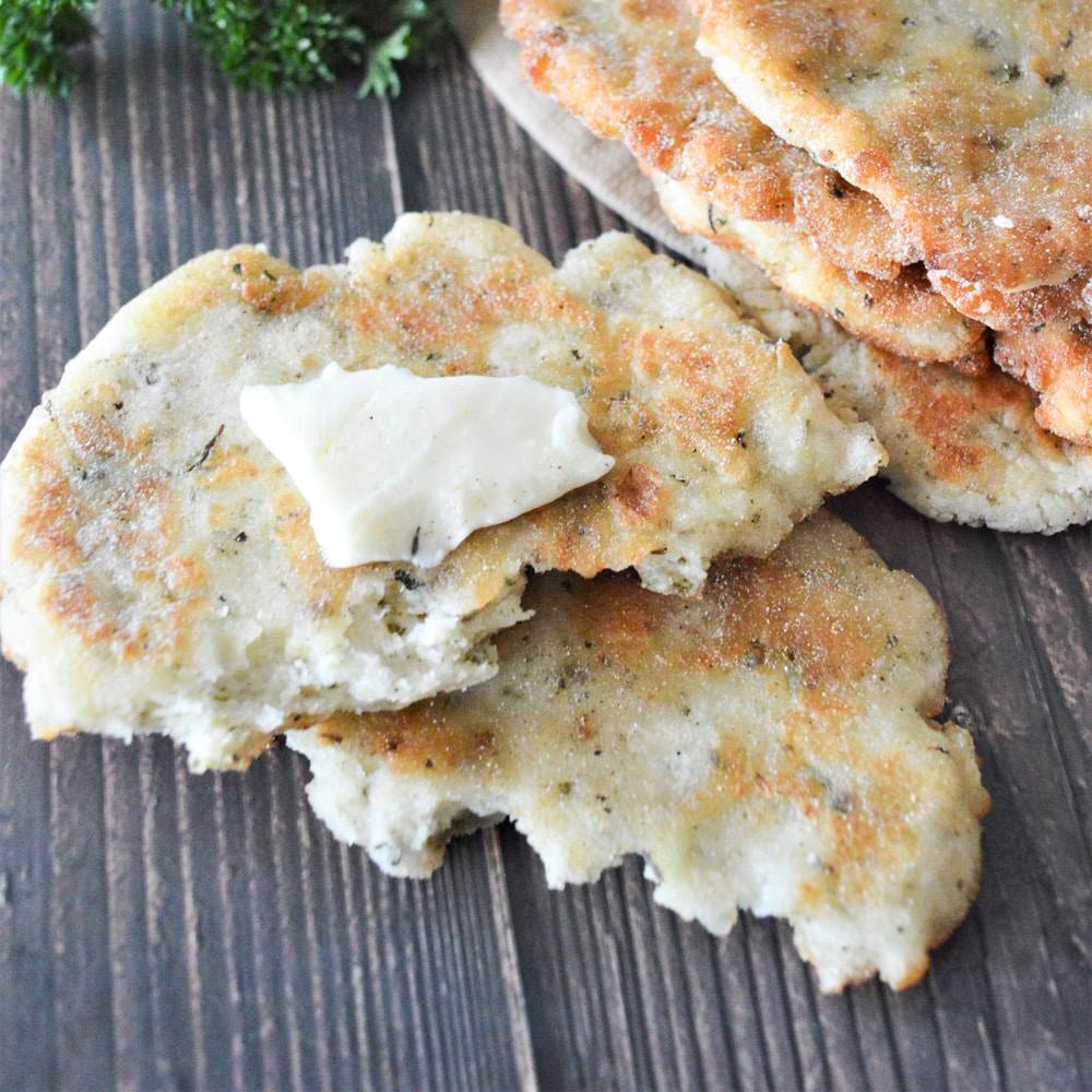 pieces of homemade flatbread with butter