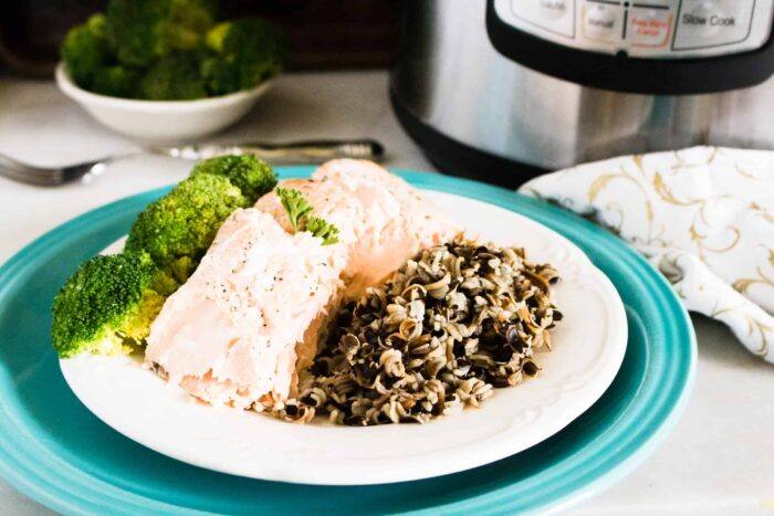 Instant Pot Lemon Garlic Salmon served with broccoli and wild rice