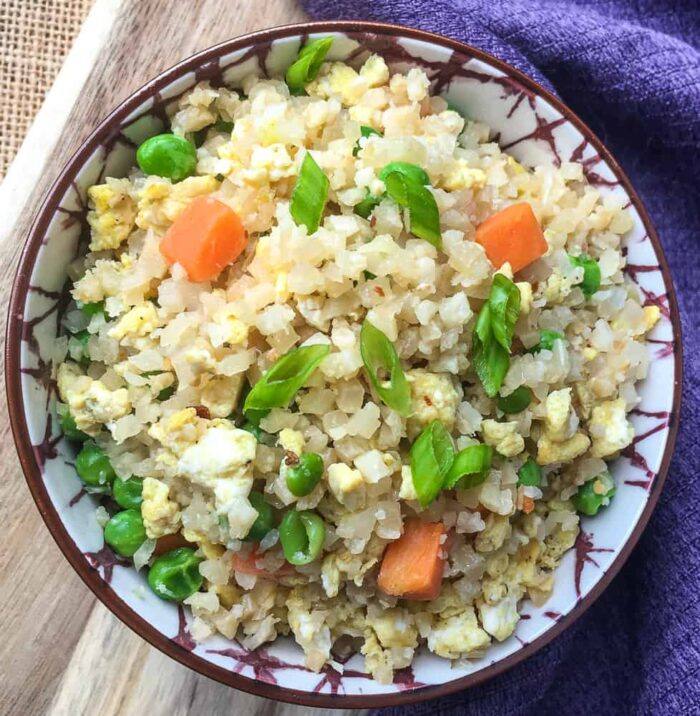 Cauliflower Fried Rice served in a ceramic dish