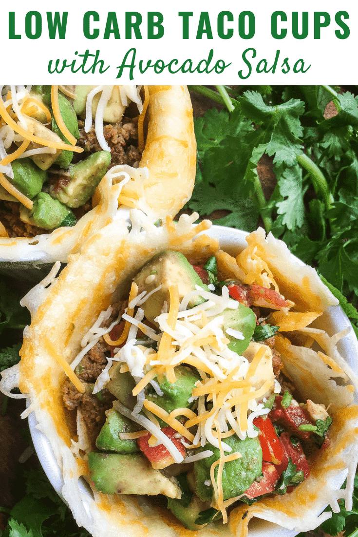 Two Low Carb Taco Cups with Avocado Salsa in white ramekins on a bed of cilantro