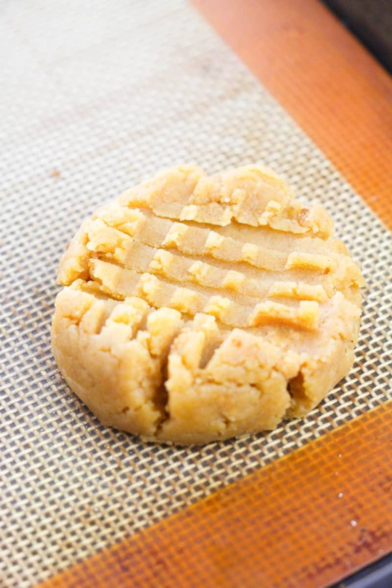 old-fashioned peanut butter cookies dough ball with fork lines