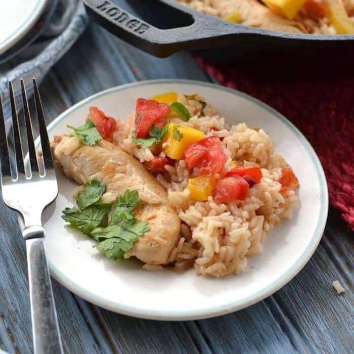 one pot mango chicken being served