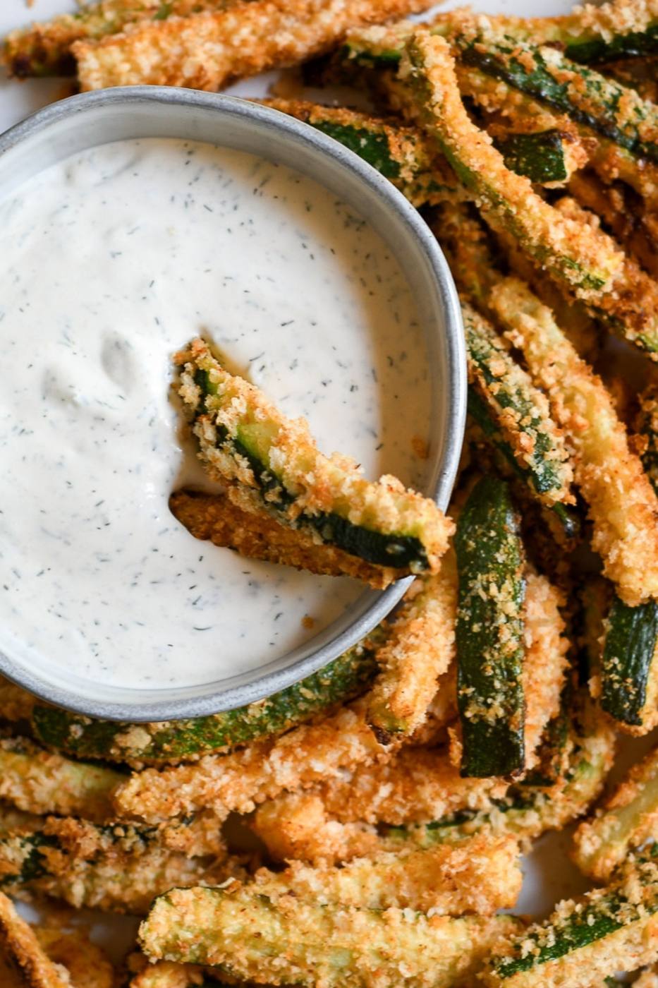 Oven Baked Zucchini Fries being served with dipping sauce