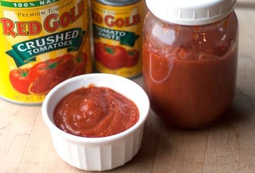 pizza calzones homemade pizza sauce next to cans of tomatoes