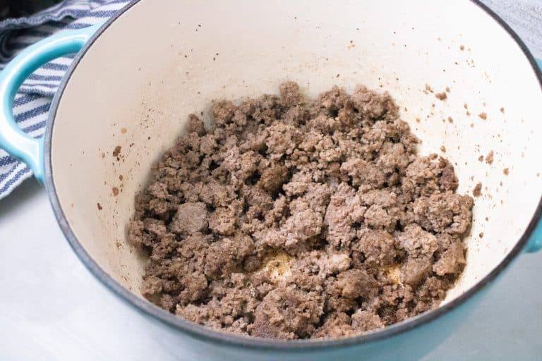 cooked ground beef in a stockpot to make Poor Man's Soup