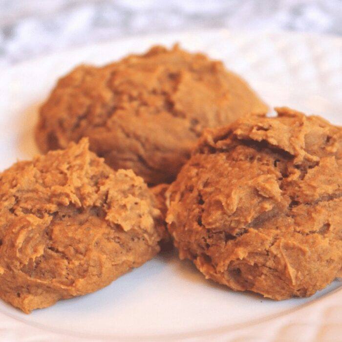 Pumpkin breakfast cookies on a white plate
