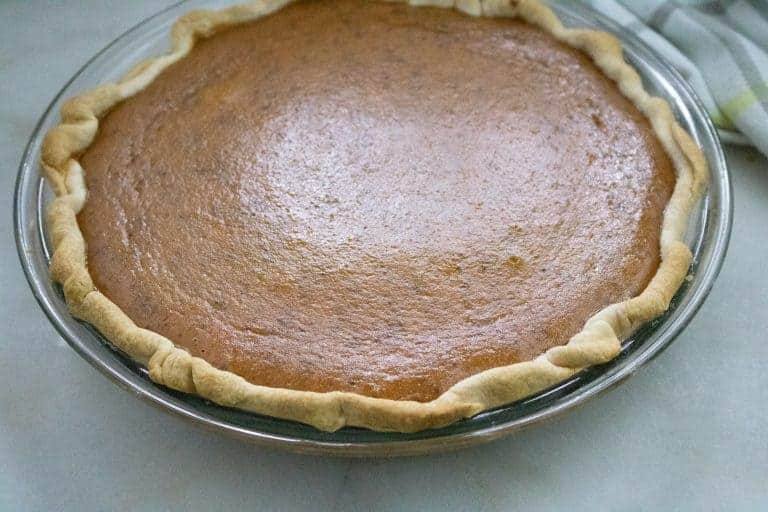 Baked pumpkin pie without meringue in a glass pie plate