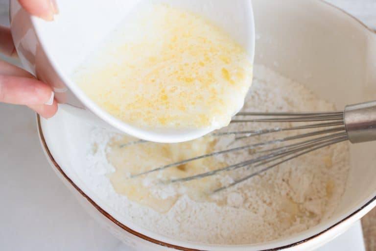 wet ingredients being added to the dry ingredients when making Copycat Red Lobster Cheddar Biscuits