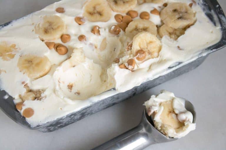 The finished Reese's Chips & Banana No-Churn easy ice cream recipe with one scoop out and ready to serve