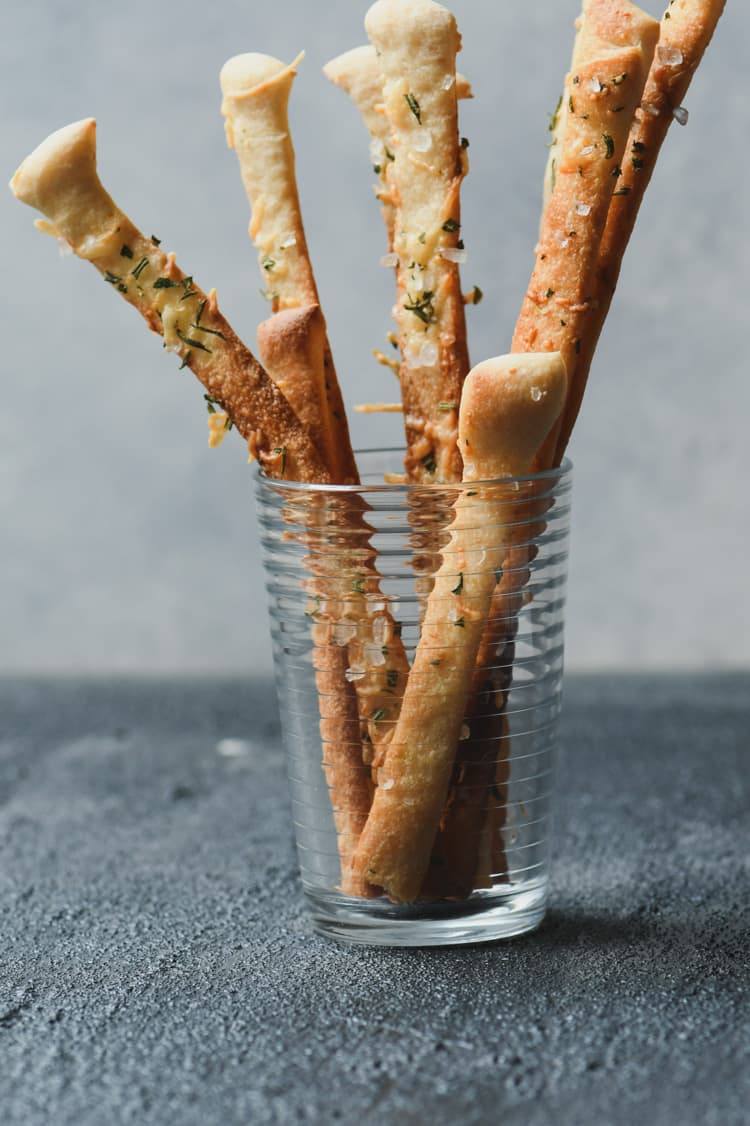 These parmesan breadsticks are perfect for dipping into the rosemary white bean dip!