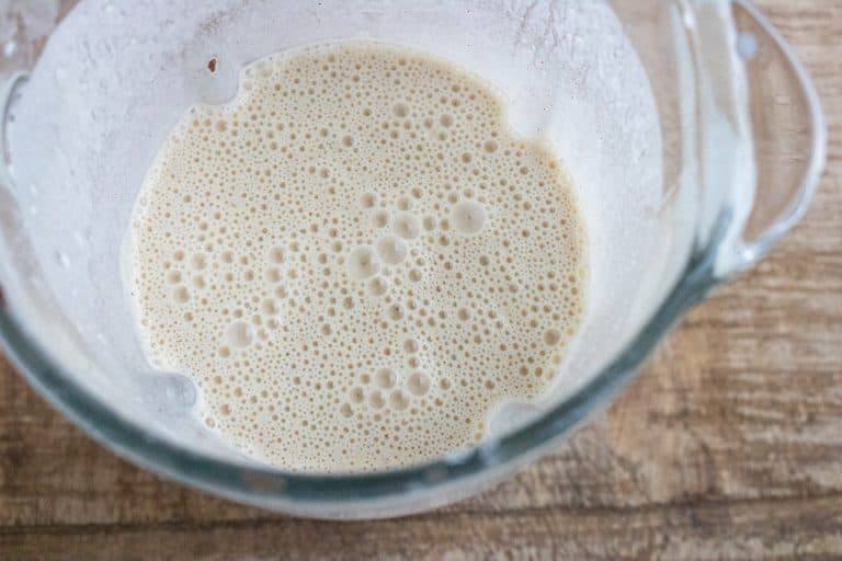 top-down view of the batter for the snickerdoodle crepes recipe inside a blender pitcher