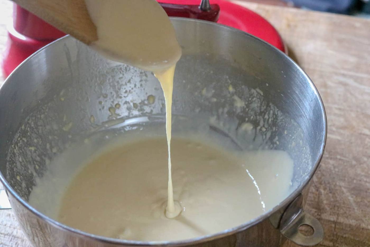 whisking the crepe batter until smooth