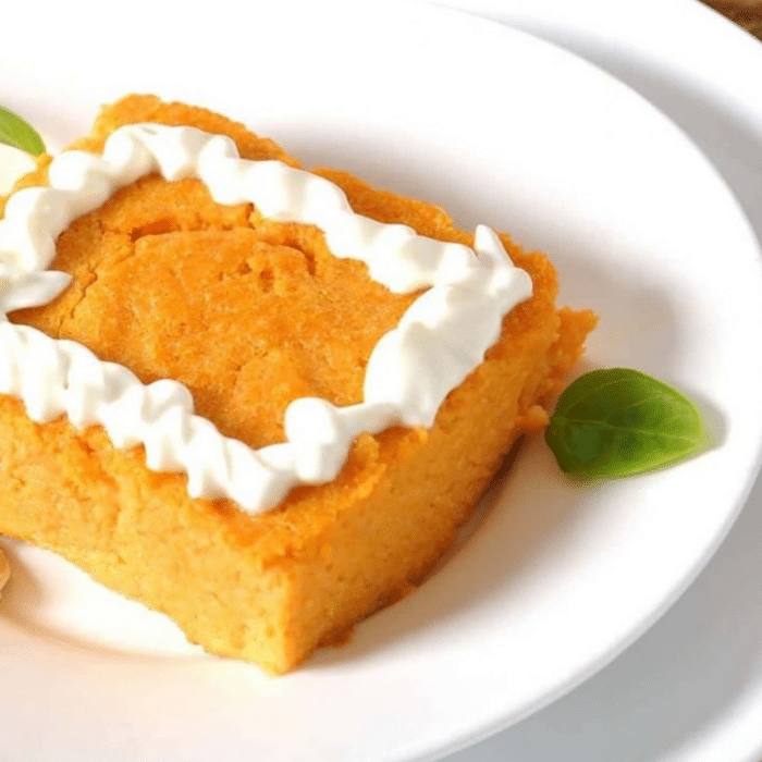 Weight Watchers crustless pumpkin pie slice with whipped topping - Zikug featured image