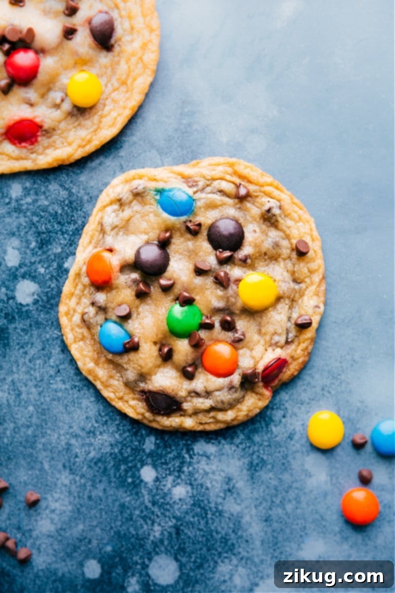 Bakery-style M&M cookies with crispy edges and a chewy center, loaded with chocolate chips
