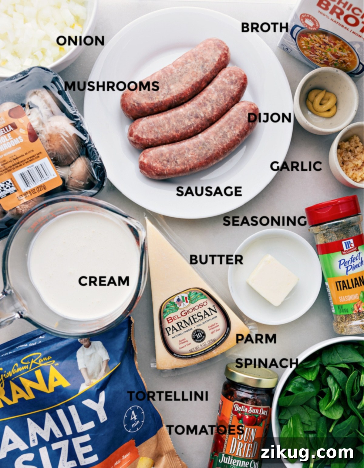 Key Ingredients for a Delicious Sausage Tortellini Bake All the fresh ingredients neatly prepped and organized, ready for easy assembly of the flavorful Sausage Tortellini Bake. Includes sausage, vegetables, cheese, and tortellini.
