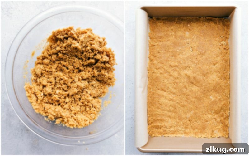 A top-down view of the pumpkin cheesecake bars in a baking pan, showing the streusel topping before caramel drizzle.