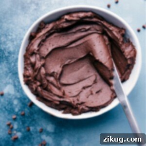 A bowl of freshly made Chocolate Buttercream Frosting, perfectly smooth and ready to adorn any dessert.