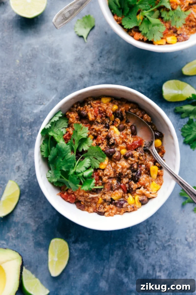 Delicious Crockpot Quinoa Chili Topped with Fresh Cilantro A steaming bowl of Crockpot Quinoa Chili topped with fresh, vibrant cilantro, ready to be served and enjoyed.