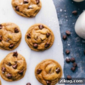 Finished cookies with a glass of milk on the side, ready for a delightful treat.