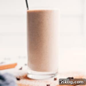 A close-up of the finished chai smoothie in a glass.
