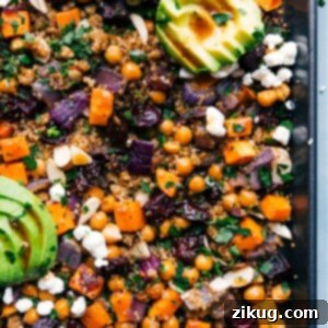 Sheet Pan Quinoa Pilaf, a healthy and easy one-pan meal with roasted vegetables and a zesty balsamic dressing.