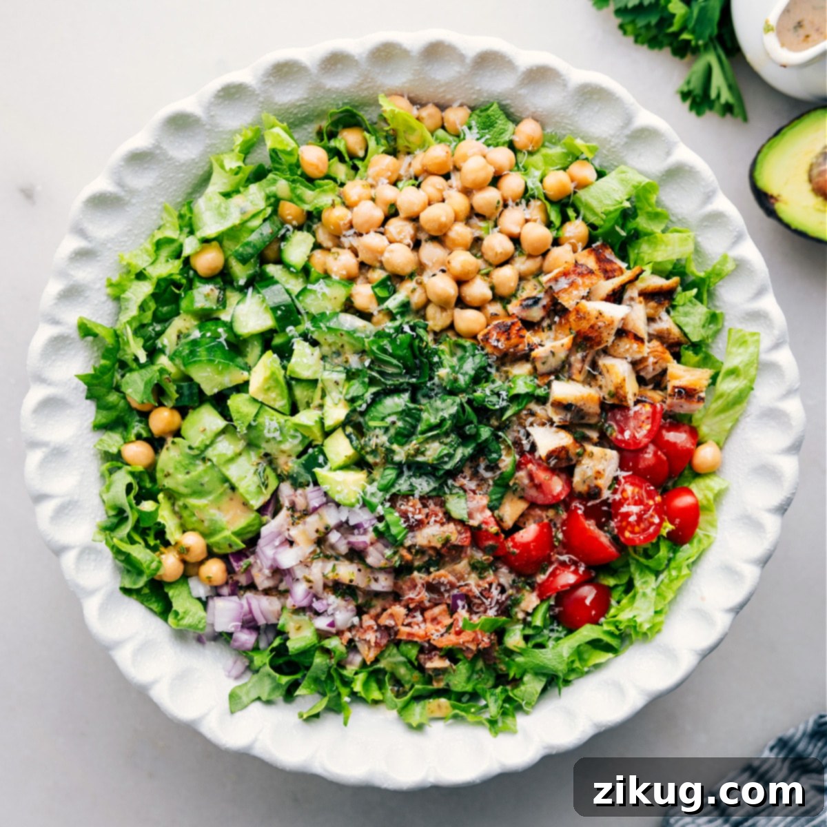 Signature Chopped Chicken Salad 2 All the ingredients added to a bowl and it all dressed with dressing for this delicious high protein dish.