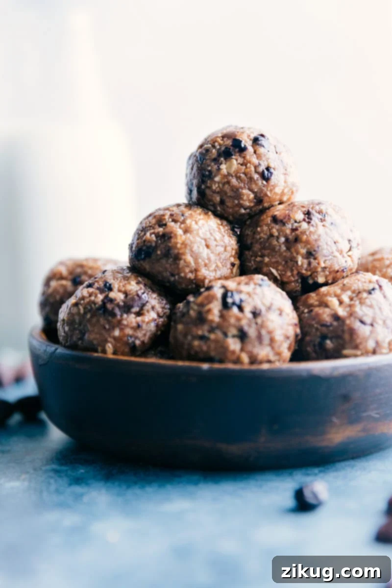 Perfectly crafted Blueberry Energy Bites: A healthy and convenient snack option for any time of day. Blueberry Energy Bites presented in a rustic bowl, ready for snacking or storage, highlighting their appetizing appearance.