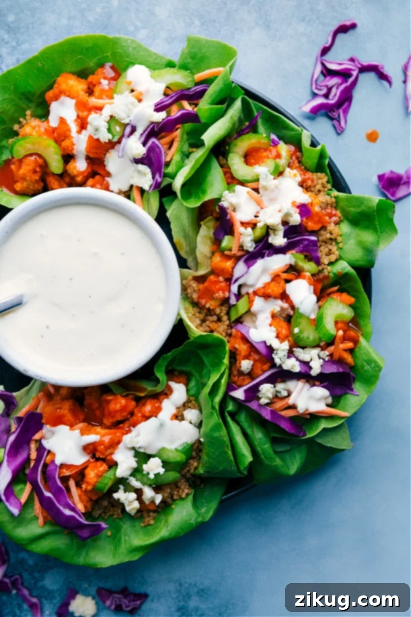 Overhead image of the vibrant Buffalo Chicken Lettuce Wraps, featuring crispy chicken, fresh vegetables, and a creamy dressing, arranged beautifully for a quick and easy dinner.