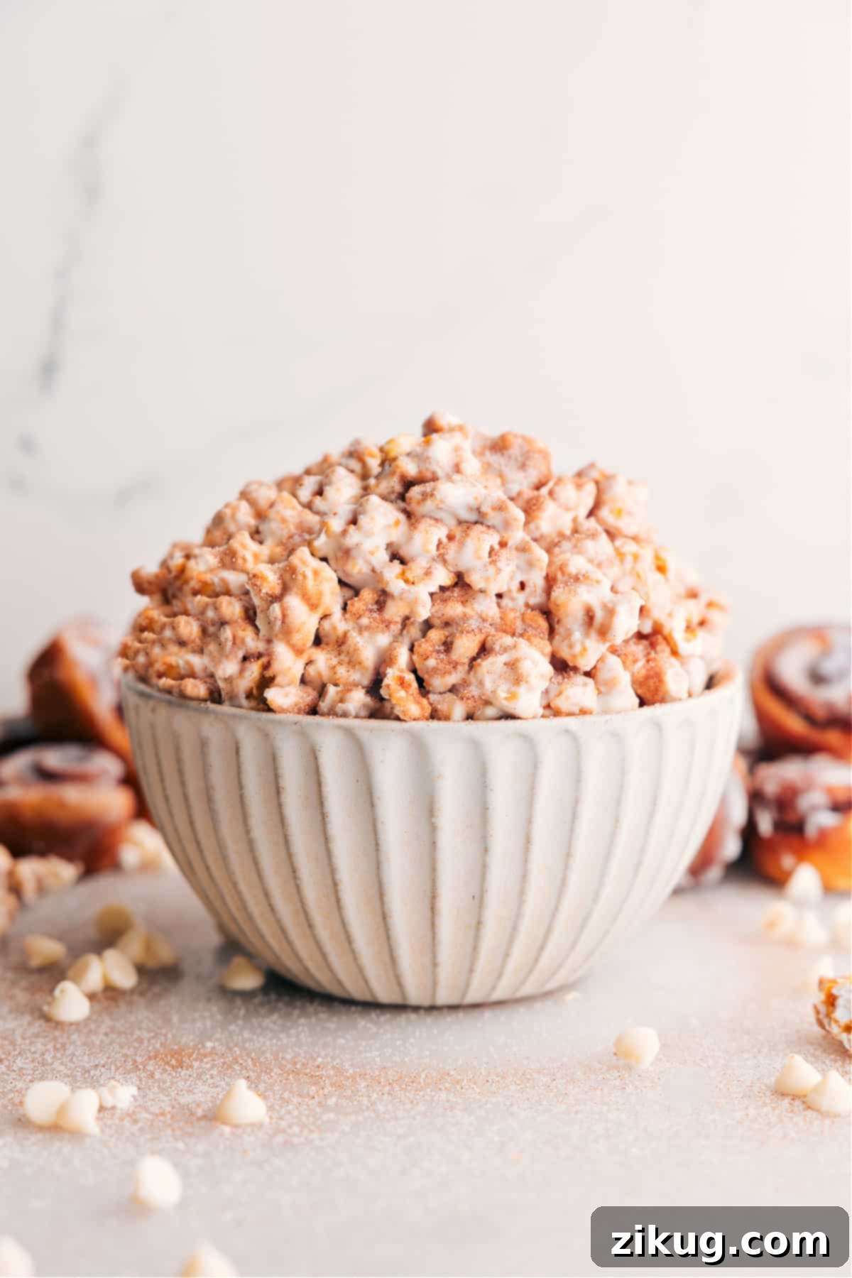 Cinnamon Roll Popcorn in a bowl, ready to serve and enjoy.