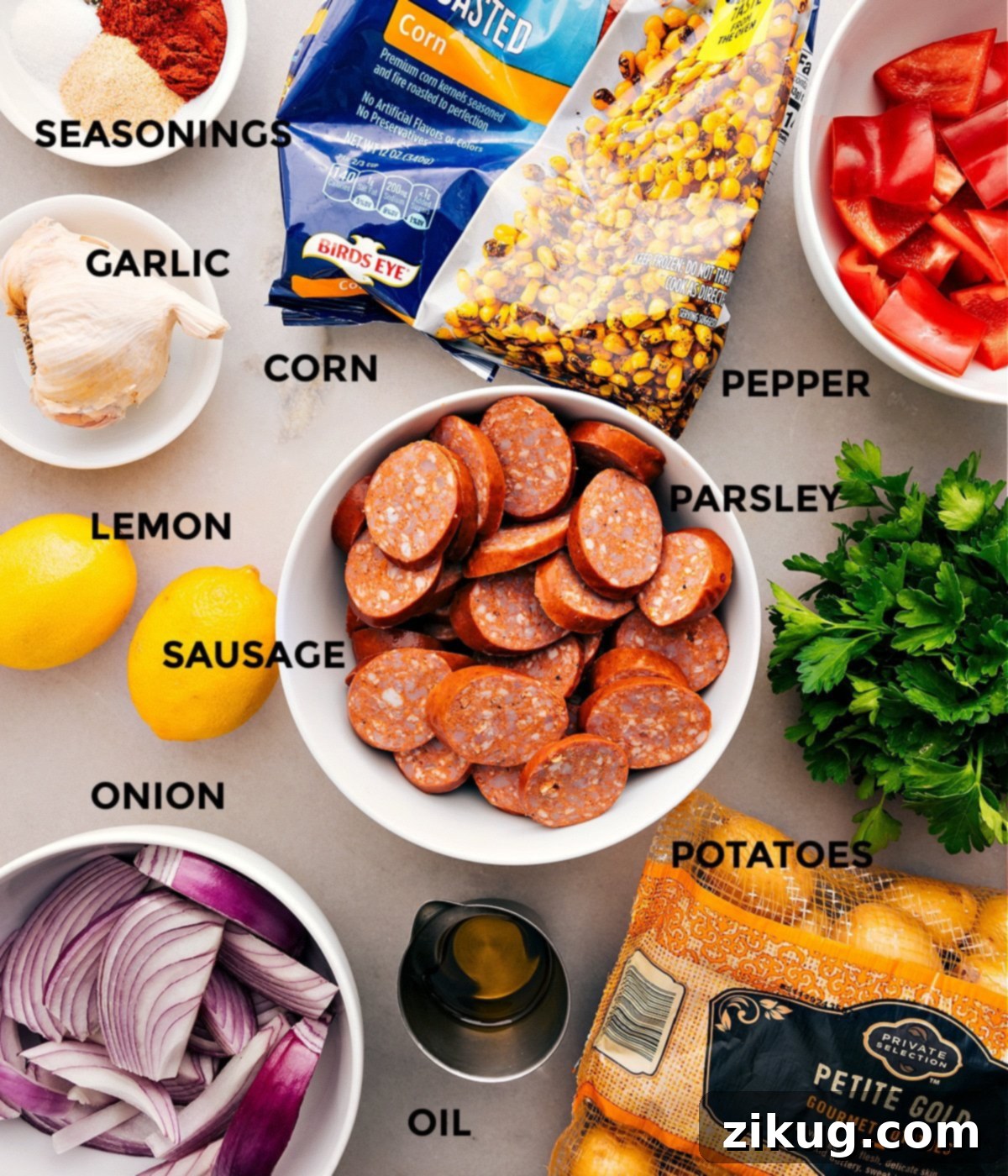 Key Ingredients For Smoked Sausage, Potatoes, & Corn This recipe has everything prepped for easy assembly: meat, veggies, lemon, seasonings, and oil.