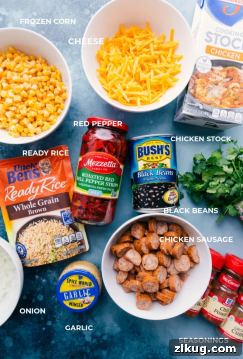 Essential Ingredients for Your Quick Sausage and Rice Dinner All ingredients laid out for one-skillet sausage and rice, including sliced smoked sausage, sweet corn, black beans, ready rice, spices, and roasted red peppers.