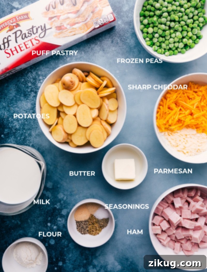 All the fresh ingredients for Ham and Potato Pot Pie meticulously prepped and laid out, including sliced potatoes, cubed ham, various cheeses, butter, milk, flour, and seasonings.