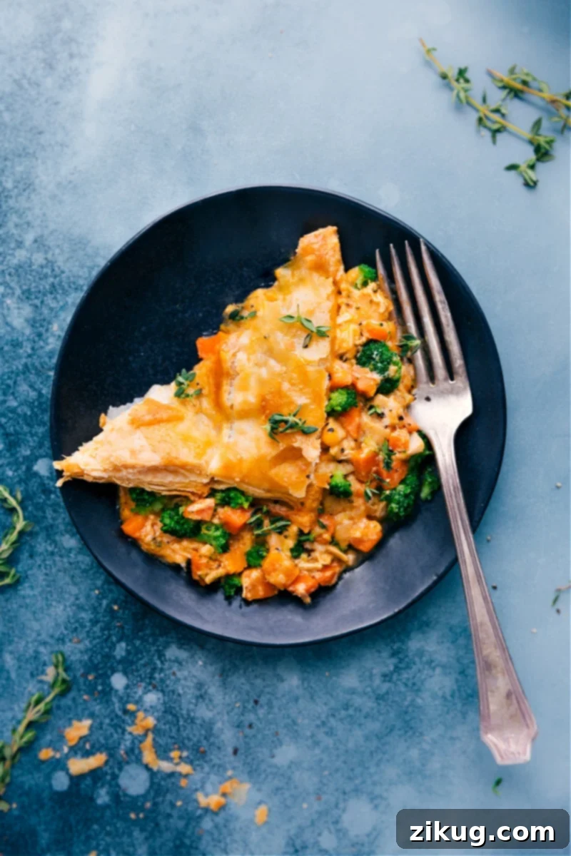 Overhead image of a golden-brown Broccoli Cheddar Pot Pie ready to be served