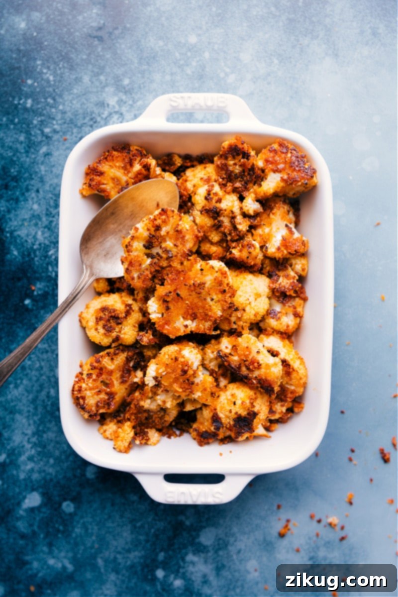 Roasted Cauliflower is the BEST way to enjoy this vegetable -- the high oven temperature yields beautiful caramelization with crisp edges and a tender interior. We have a basic, all-purpose Roasted Cauliflower recipe as well as a show-stopping Parmesan-breadcrumb-crusted version. Recipe via ChelseasMessyApron #side #thanksgiving #best #quick #easy #simple #healthy #cleaneating #snack #roasted #cauliflower Perfectly Roasted Cauliflower with golden edges and tender interior, two ways: classic and Parmesan-crusted.