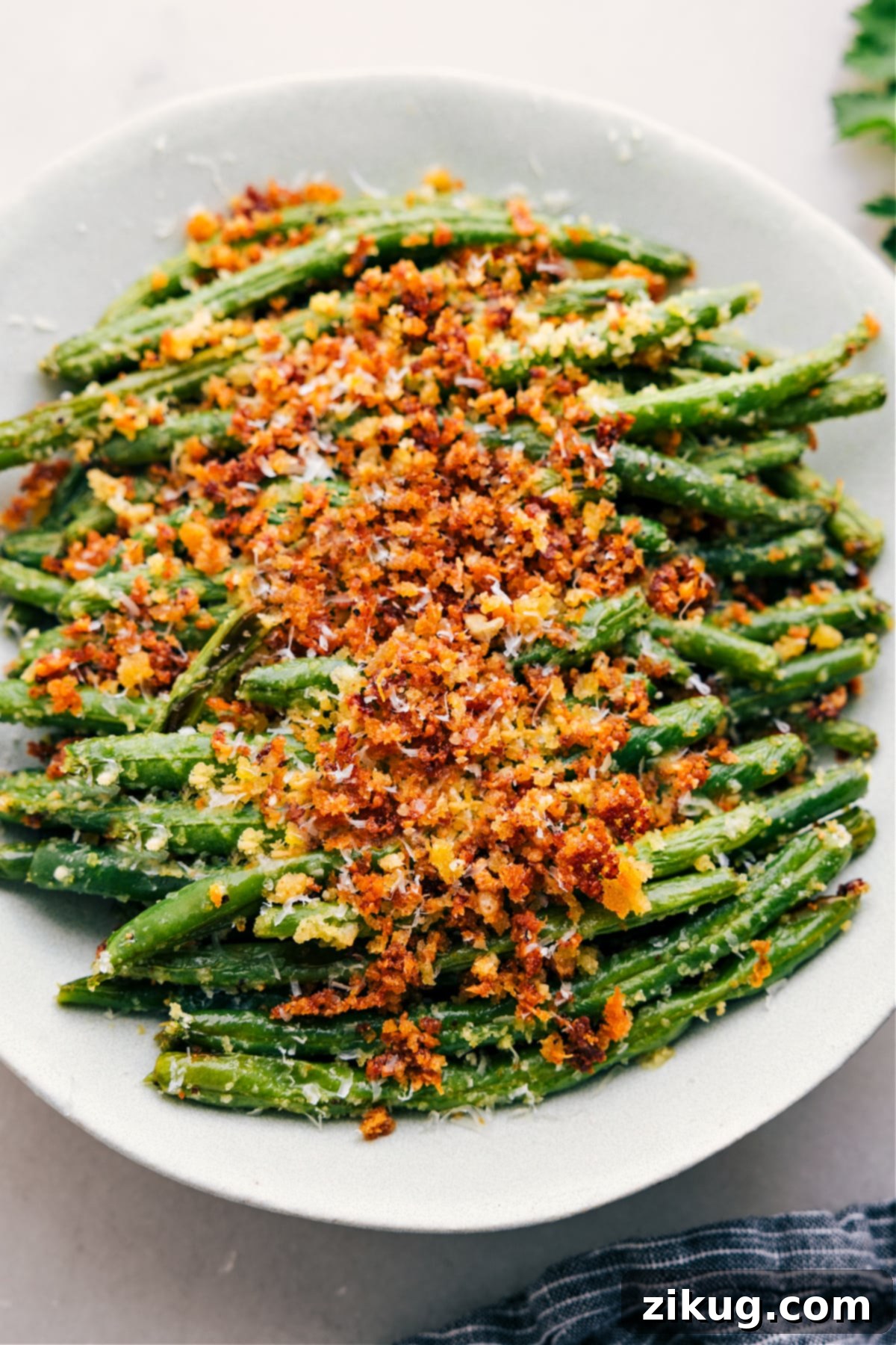 The Best Side ish: Roasted Green Beans A tray of perfectly roasted green beans, hot and ready to be served as a delicious side dish.