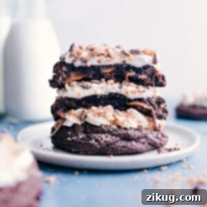 English Toffee Chocolate Cookies 2 Close-up image of Heath Bar Cookies, showcasing the generous frosting and toffee bits