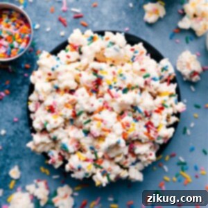 A bowl of Cake Batter Popcorn with sprinkles.